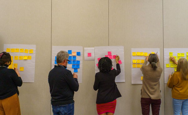 Summit Attendees During a Working Session Summit Attendees During a Working Session